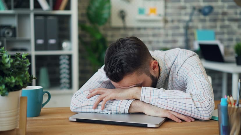 Sleeping at the Office: A Sign of Strength or Strain?