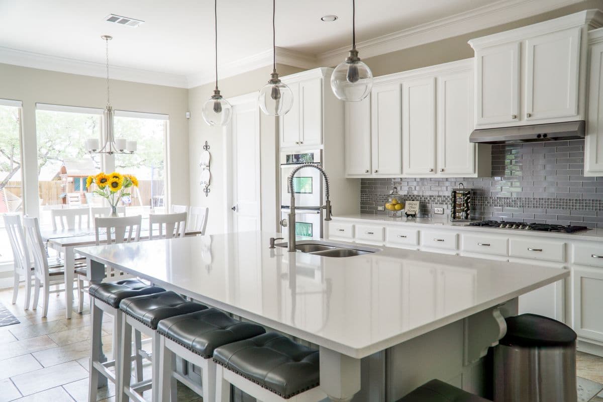 Bright kitchen with island seating from the illustrative property album