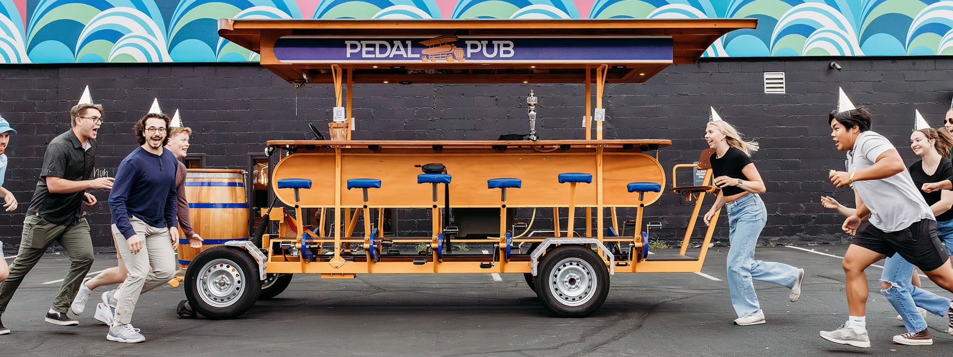 Guests with a Pedal Pub bike