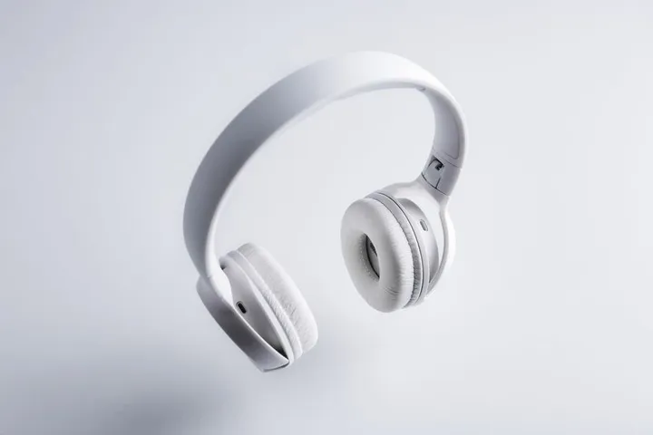 White wireless over-ear headphones used to illustrate a product card